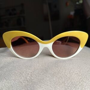 Crap Eyewear cream and yellow cat eyed sunglasses